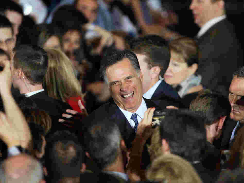 Mitt Romney greets supporters during an Illinois GOP primary victory party in Schaumburg. 