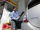 A driver pumps gas into his Toyota Prius hybrid at a gas station in Sunnyvale, Calif., in 2007. A driver pumps gas into his Toyota Prius hybrid at a gas station in Sunnyvale, Calif., in 2007.