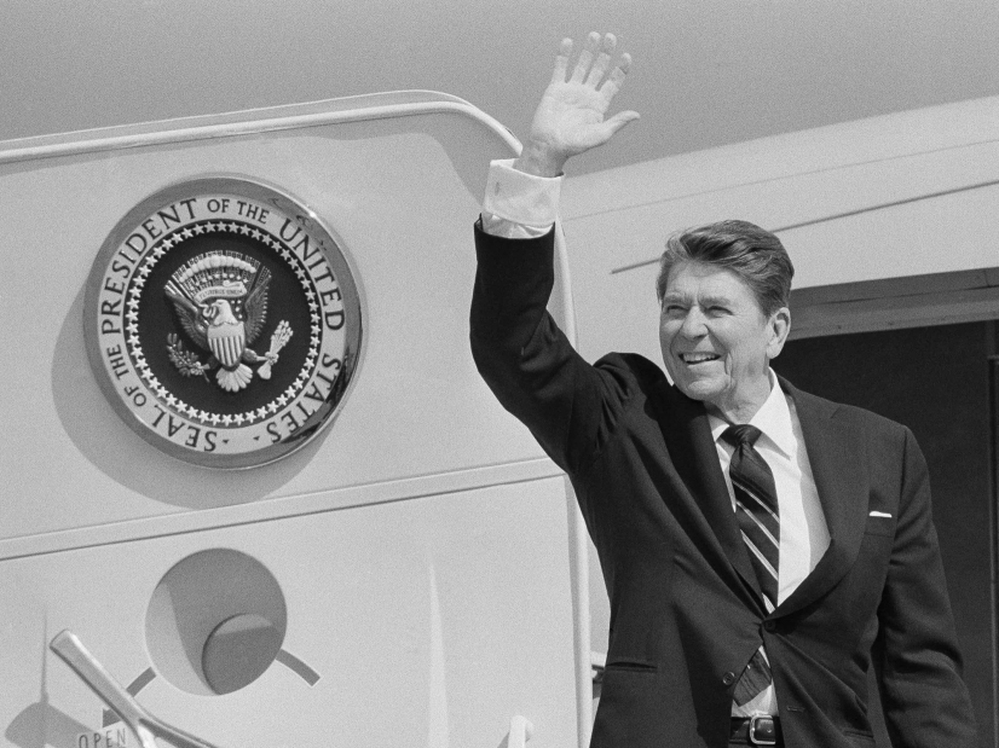 President Ronald Reagan looms over today's GOP field. Here he waves as he boards Air Force One after a brief three-hour visit to Washington state on April 20, 1984. 