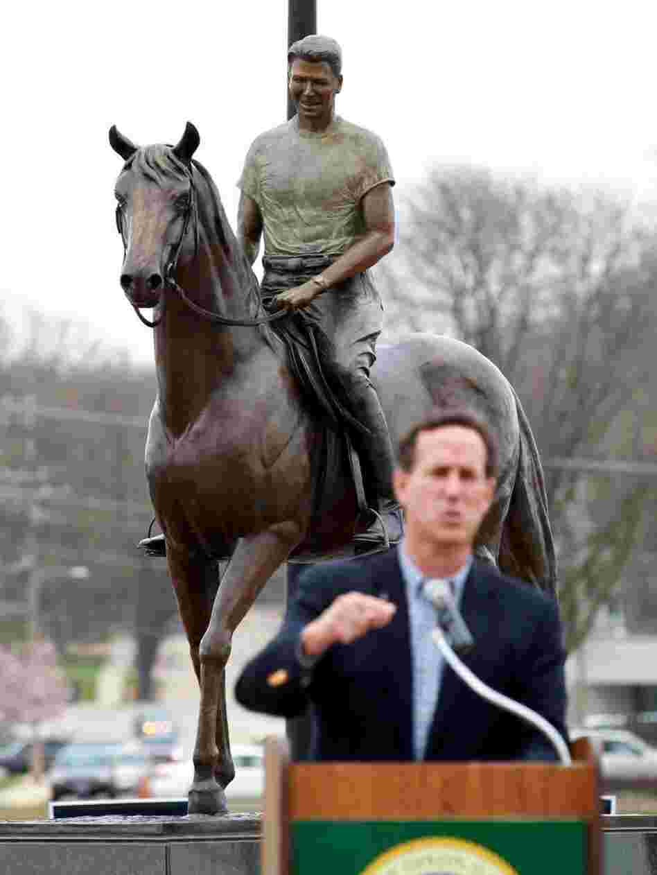 Rick Santorum speaks during a campaign stop in Dixon, Ill., on March 19. Is the party's obsession with Ronald Reagan overshadowing today's candidates? 