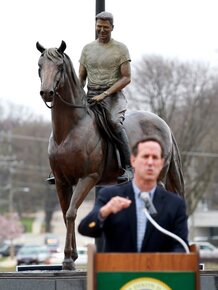 Rick Santorum speaks during a campaign stop in Dixon, Ill., on March 19. Is the party's obsession with Ronald Reagan overshadowing today's candidates? Rick Santorum speaks during a campaign stop in Dixon, Ill., on March 19. Is the party's obsession with Ronald Reagan overshadowing today's candidates?