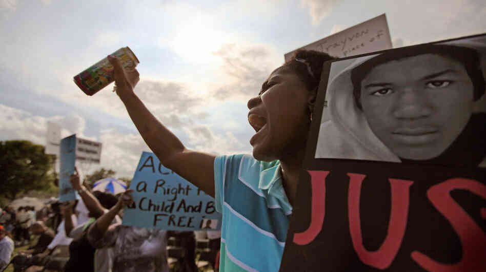 Lakeshe Hall demonstrates at a rally for slain teenager Trayvon Martin on Thursday in Sanford, Fla.
