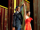 Are You Not Entertained? TV host Caesar Flickerman (Stanley Tucci) takes the celebrity interview to new lows when chatting up the young combatants in the to-the-death Hunger Games — including Katniss Everdeen (Jennifer Lawrence). Are You Not Entertained? TV host Caesar Flickerman (Stanley Tucci) takes the celebrity interview to new lows when chatting up the young combatants in the to-the-death Hunger Games — including Katniss Everdeen (Jennifer Lawrence).