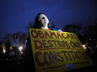 Sally Baptiste from Orlando, Fla., waits outside the U.S. Capitol for the vote on the health care bill on March 21, 2010. Sally Baptiste from Orlando, Fla., waits outside the U.S. Capitol for the vote on the health care bill on March 21, 2010.