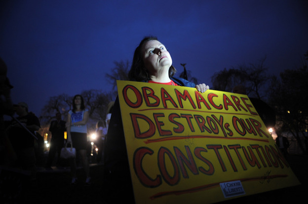 Sally Baptiste from Orlando, Fla., waits outside the U.S. Capitol for the vote on the health care bill on March 21, 2010.