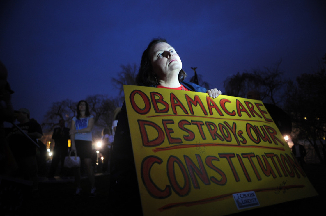 Sally Baptiste from Orlando, Fla., waits outside the U.S. Capitol for the vote on the health care bill on March 21, 2010.