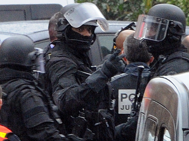 Members of a special police force unit at the site of the standoff in Toulouse, France, today. 