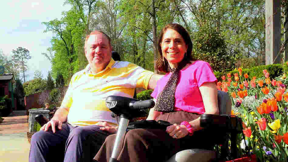 Dorothy Biebrich's red scooter helped Winslow Jackson break the ice with her back in 2006. Today the couple, shown here at the Atlanta Botanical Garden, spend their days having fun together. 