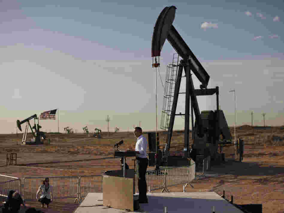 President Obama defends his energy policies, using as a backdrop an oil and gas production field on federal land in New Mexico, Wednesday, March, 21, 2012. 