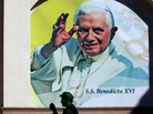 Pope Benedict XVI is expected to speak out against drug violence during his visit to Mexico, which begins Friday. Here, an actor is shown in front of a poster announcing the pope's visit Wednesday in the Mexican city of Leon, Guanajuato state. Pope Benedict XVI is expected to speak out against drug violence during his visit to Mexico, which begins Friday. Here, an actor is shown in front of a poster announcing the pope's visit Wednesday in the Mexican city of Leon, Guanajuato state.