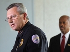 Sanford Police Department Chief Bill Lee (left) announces he will temporarily step down in the wake of the Trayvon Martin killing.