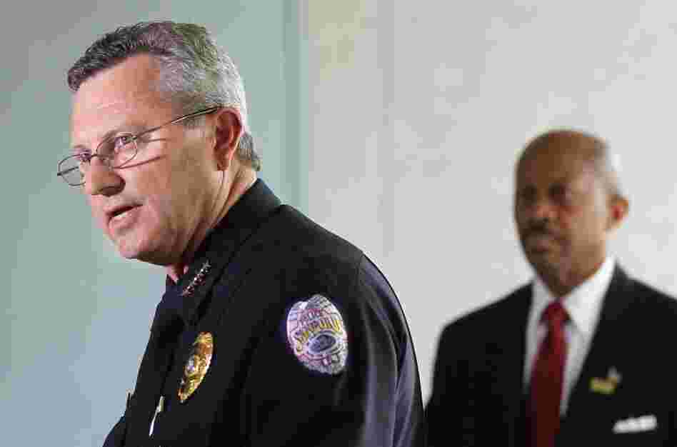 Sanford Police Department Chief Bill Lee (left) announces he will temporarily step down in the wake of the Trayvon Martin killing.