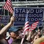 Protesters rally for religious freedom in front of Philadelphia's Independence Hall on Friday. Rallies took place nationwide to protest the mandate that some religious organizations cover the cost of contraception. Protesters rally for religious freedom in front of Philadelphia's Independence Hall on Friday. Rallies took place nationwide to protest the mandate that some religious organizations cover the cost of contraception.