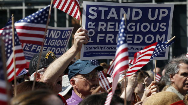 Protesters rally for religious freedom in front of Philadelphia's Independence Hall on Friday. Rallies took place nationwide to protest the mandate that some religious organizations cover the cost of contraception.