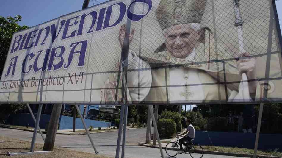 A man rides his bicycle past a billboard welcoming Pope Benedict XVI, just days before his arrival, in Havana, Cuba. Pope Benedict's trip to Latin America includes Mexico and Cuba. A man rides his bicycle past a billboard welcoming Pope Benedict XVI, just days before his arrival, in Havana, Cuba. Pope Benedict's trip to Latin America includes Mexico and Cuba.