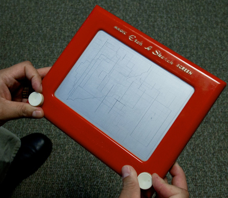 Etch A Sketch: The two with knobs on both sides. Etch A Sketch: The two with knobs on both sides.