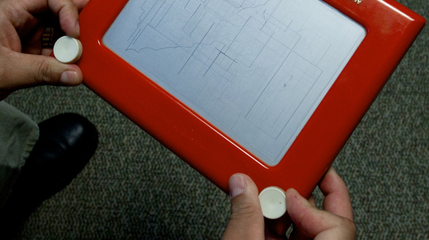 Etch A Sketch: The two with knobs on both sides. (AFP/Getty Images)
