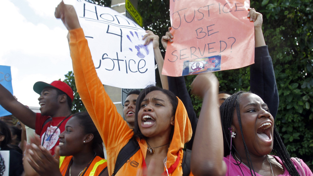 Michael M. Krop Senior High School students chant during a rally demanding justice for Trayvon Martin, on Friday.