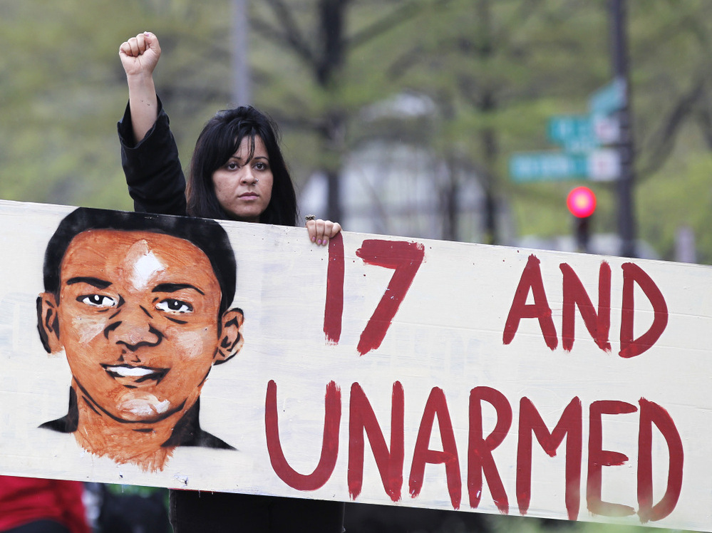 Feriha Kaya attends a rally demanding justice for Trayvon Martin on Saturday in Washington, D.C. Protesters have demonstrated over the case in several cities.