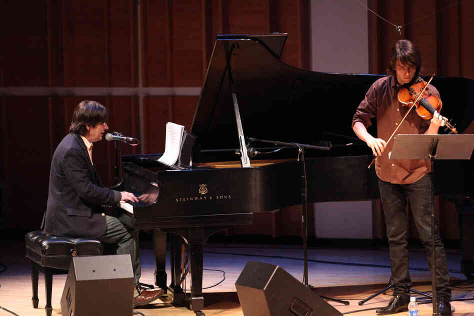 Darnielle and the violinist/composer Owen Pallett, who created tonight's arrangements of Darnielle's songs as the song cycle Transcendental Youth. 