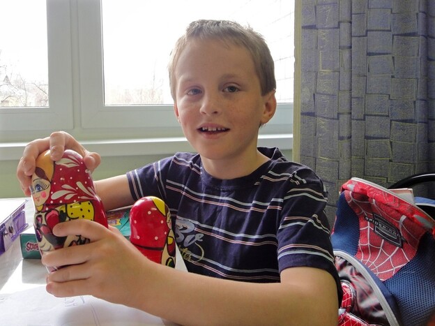 Artyom Savelyev, now 9, plays with a Matryoshka doll in a children's hospital in Moscow in 2010. The American woman who adopted him sent him back to Russia two years ago.