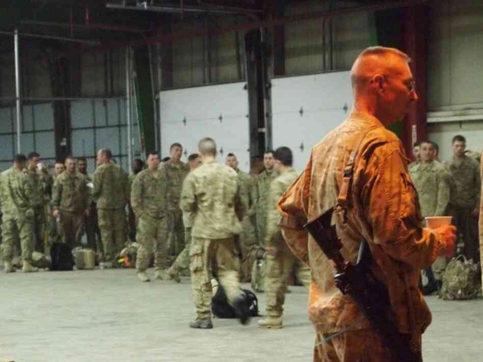 Members of the 182nd Infantry Regiment arrive in Indiana after spending a year in Afghanistan. They will spend about a week here before returning to their homes in New England.
