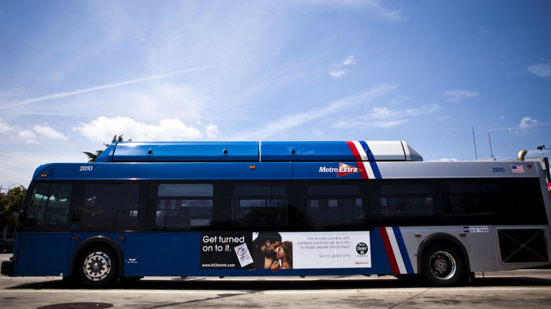 A bus in Washington, D.C., displays an advertisement for a female condom in July 2010. To encourage their use, community groups distributed more than 500,000 of the female condoms, flexible pouches that are wider than a male condom but similar in length, during instruction sessions at beauty salons, barber shops, churches and restaurants.