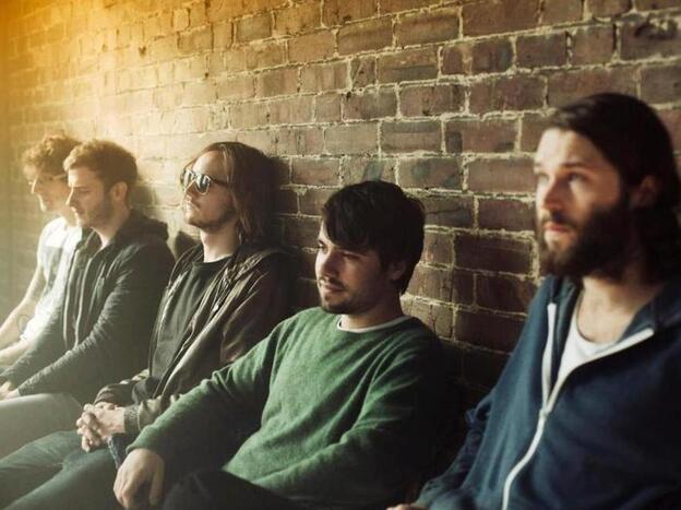 A veteran of punk bands, Dry the River's Peter Liddle (center) began playing acoustic guitar to keep quiet as a med student.
