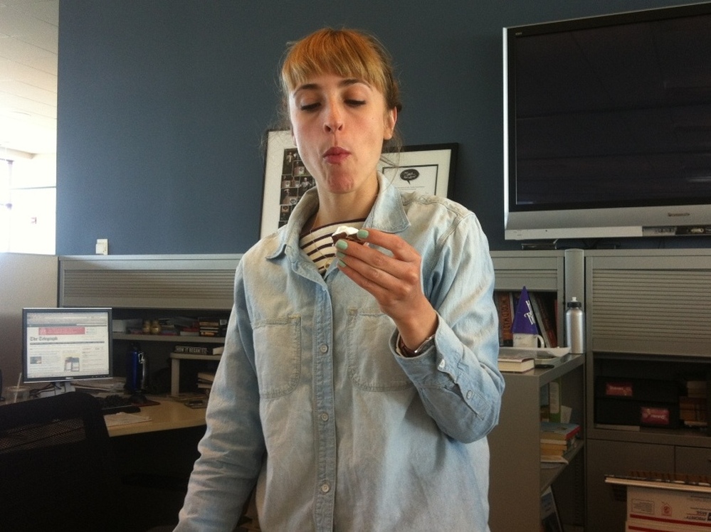 Eva regards the Deviled Cadbury Creme Egg as it should be regarded: suspiciously. 