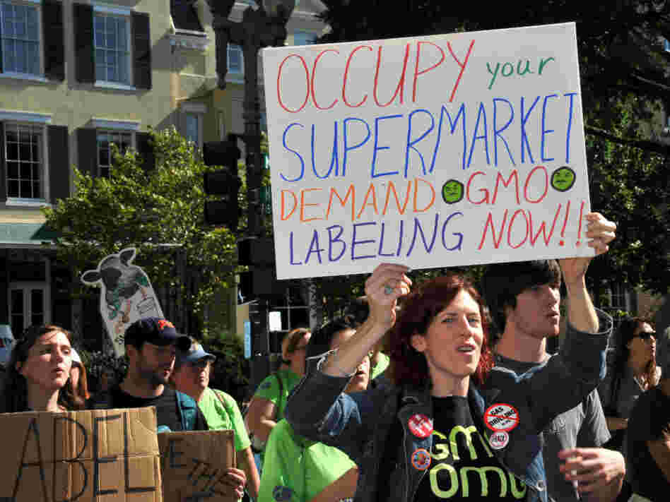 People march demanding labels for genetically modified food near the White House in Washington, D.C., on Oct. 16, 2011. 