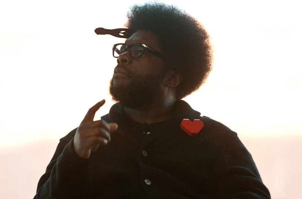 "Let's be real. We're all geeks in this room." ?uestlove, of The Roots, addresses the EMP Pop Conference on Sunday. At this moment, the drummer, producer and DJ was demonstrating the delighted confusion he tries to instigate on the dancefloor, which is why he spent years searching for the Spanish-language version of Kool and the Gang's "Celebration."