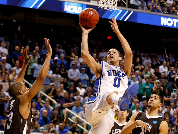 Duke freshman Austin Rivers, seen here in the Blue Devils' loss to Lehigh in the NCAA tournament, is leaving school for the NBA draft. The trend of athletes spending only one year in college has hurt the sport, says Frank Deford.
