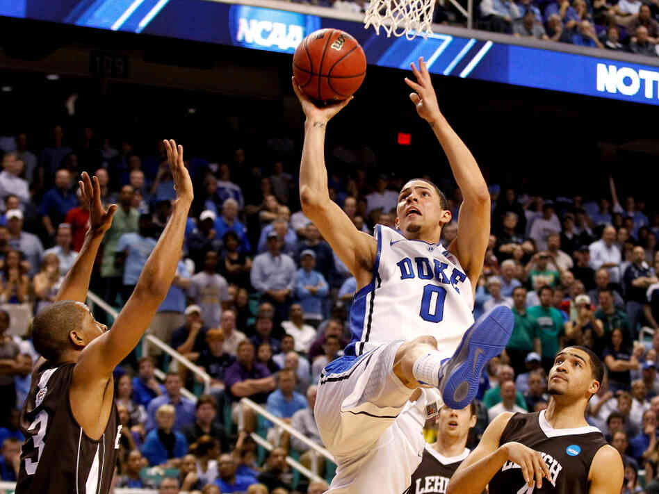 Duke freshman Austin Rivers, seen here in the Blue Devils' loss to Lehigh in the NCAA tournament, is leaving school for the NBA draft. The trend of athletes spending only one year in college has hurt the sport, says Frank Deford.