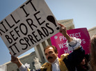 Opponents and supporters of President Obama's health care overhaul rallied outside the Supreme Court on Tuesday. Bob Mason shows support for the Tea Party by dressing in costume as one of the Founding Fathers. Opponents and supporters of President Obama's health care overhaul rallied outside the Supreme Court on Tuesday. Bob Mason shows support for the Tea Party by dressing in costume as one of the Founding Fathers.