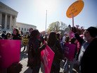 Supporters and opponents of the health care law rallied in front of the Supreme Court Tuesday, as the court considered the constitutionality of the insurance mandate. Supporters and opponents of the health care law rallied in front of the Supreme Court Tuesday, as the court considered the constitutionality of the insurance mandate.