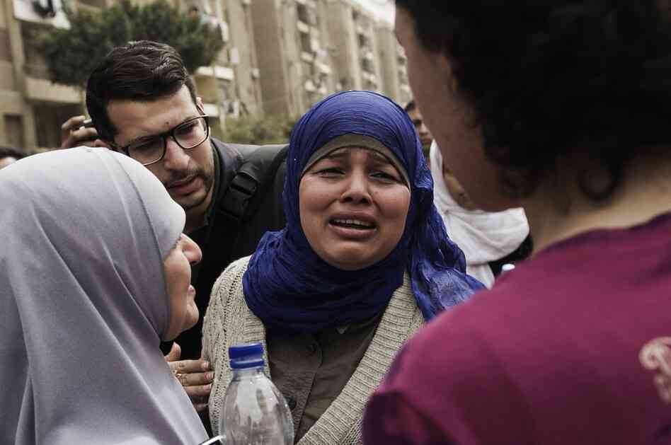 Samira Ibrahim, an Egyptian woman who brought the case against an army doctor accused of conducting forced "virginity checks" on female protesters last year, breaks into tears outside a military court in Cairo on March 11 after hearing that the doctor was acquitted. Samira Ibrahim, an Egyptian woman who brought the case against an army doctor accused of conducting forced "virginity checks" on female protesters last year, breaks into tears outside a military court in Cairo on March 11 after hearing that the doctor was acquitted.