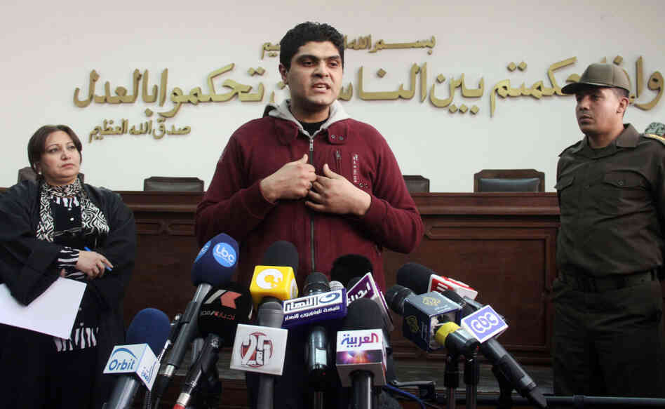 Egyptian army doctor Ahmed Adel speaks during a news conference at a military court in Cairo on March 11. Charged in the case of forced virginity tests on Egyptian protesters last year, he was acquitted. 