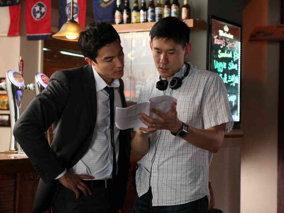 Director Daniel Hsia (right) talks with Henney on the set of Shanghai Calling. Director Daniel Hsia (right) talks with Henney on the set of Shanghai Calling.