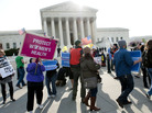 Activists gather in front of the U.S. Supreme Court on Wednesday as the court hears a third day of arguments on President Obama's health care law. Activists gather in front of the U.S. Supreme Court on Wednesday as the court hears a third day of arguments on President Obama's health care law.