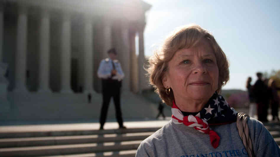 Carolyn Weller came from Idaho to join the scene outside the Supreme Court.