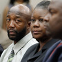 Tracy Martin (left) and Sybrina Fulton appear at a forum held by Democratic members of Congress in Washington on Tuesday. Lawmakers discussed the death of the couple's son, Trayvon Martin, and racial profiling. 