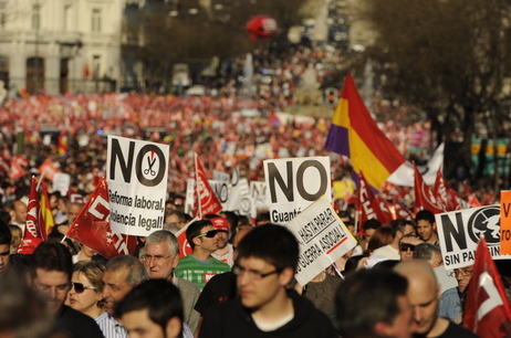 People attend a demonstration in Madrid on Thursday during a national strike. People attend a demonstration in Madrid on Thursday during a national strike.