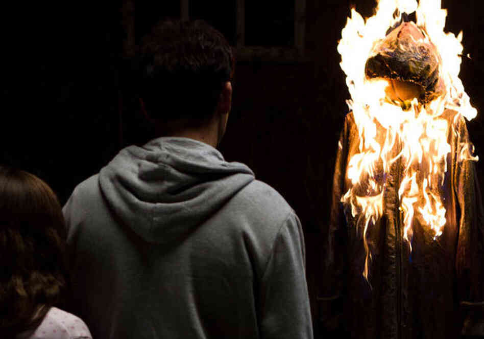 To show Mia her nightmares can't hurt her, John makes and burns an effigy of the bogeyman. To show Mia her nightmares can't hurt her, John makes and burns an effigy of the bogeyman.