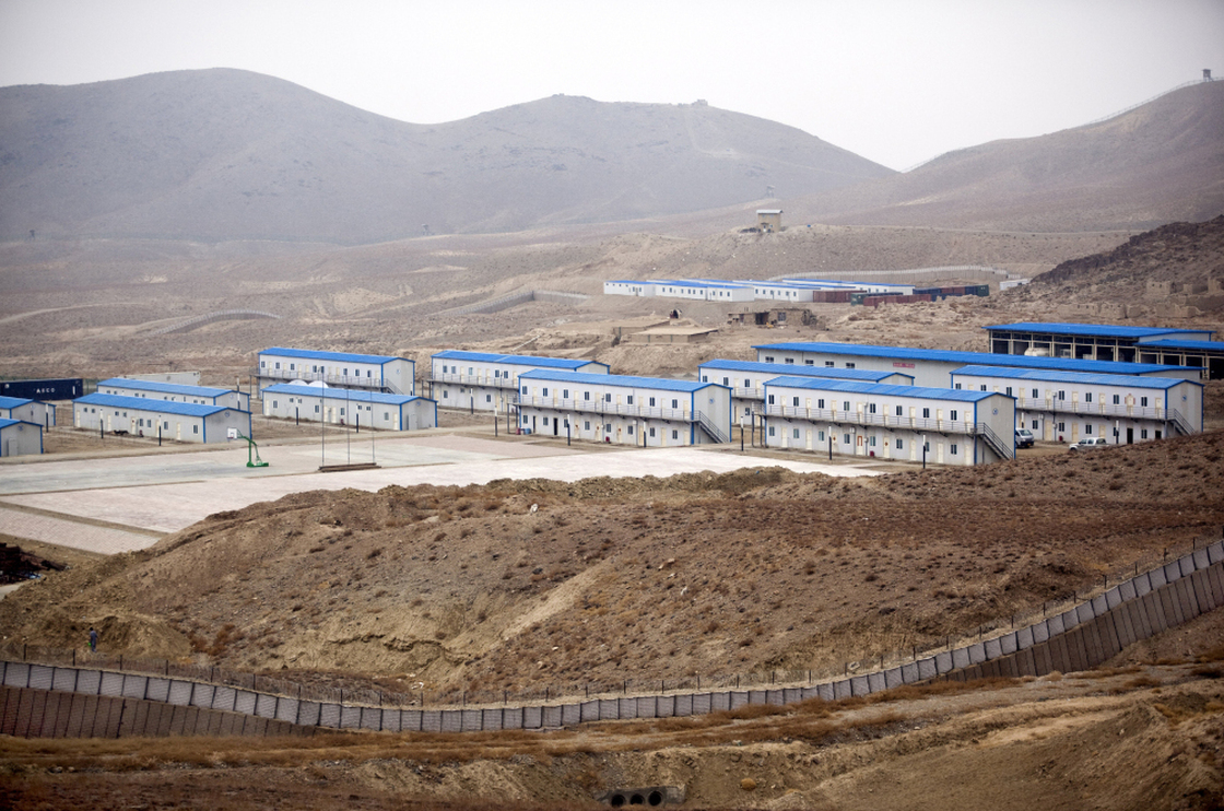 Hesco barriers and concertina wire surround the living quarters of the Chinese-owned Ainak copper mine in Logar, Afghanistan, in 2011.