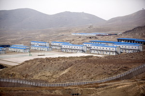 Hesco barriers and concertina wire surround the living quarters of the Chinese-owned Ainak copper mine in Logar, Afghanistan, in 2011. Hesco barriers and concertina wire surround the living quarters of the Chinese-owned Ainak copper mine in Logar, Afghanistan, in 2011.