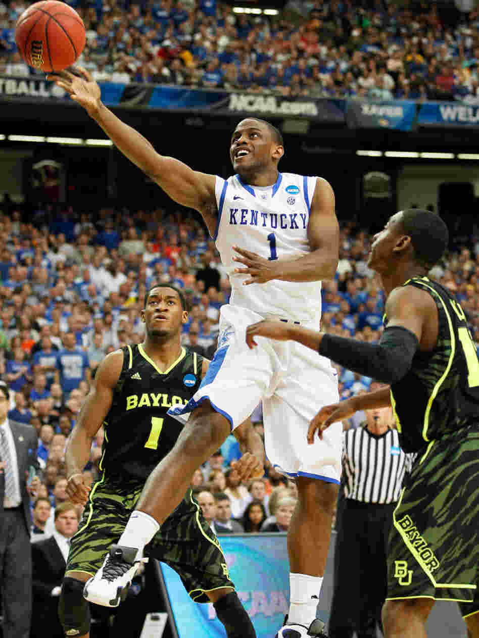 Senior guard Darius Miller of Kentucky shoots during the Wildcats' win over Baylor in the South Regional final. Kentucky, the NCAA Tournament's No. 1 seed, faces rival Louisville in the Final Four Saturday.