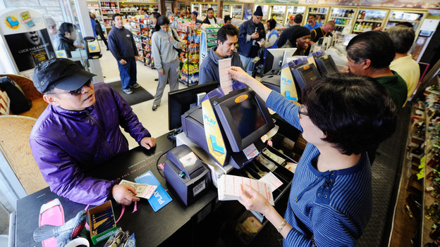 In Hawthorne, Calif., on Thursday, customers lined up for Mega Millions tickets at the Bluebird liquor store. 