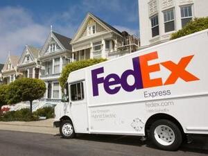 A FedEx hybrid delivery truck. In FedEx's fleet of over 90,000 vehicles, 408 are hybrid or electric, and 4,000 are fuel-efficient, lower-emitting "Sprinter" vans. 