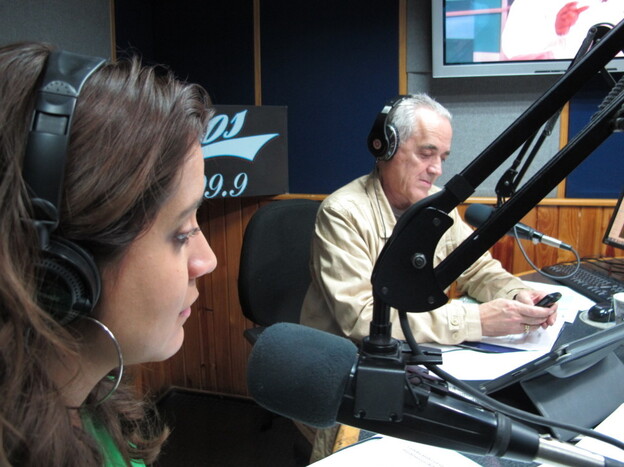 Venezuelan radio host Nelson Bocaranda (right) anchors his evening talk show, The Happy Traffic Jam, with co-host Mariela Celis in Caracas during a recent March broadcast.