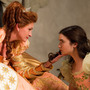 Lily Collins plays Snow White in Mirror Mirror opposite Julia Roberts as the vain Queen jealous of Snow's beauty. Lily Collins plays Snow White in Mirror Mirror opposite Julia Roberts as the vain Queen jealous of Snow's beauty.